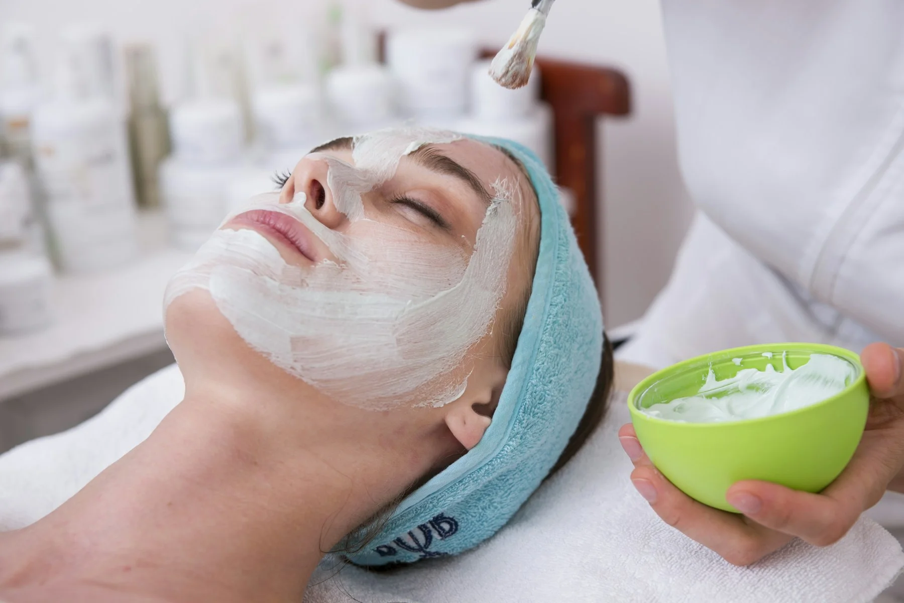 Adult receiving a non-graphic facial treatment